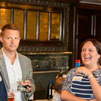 Guests gather after event to network